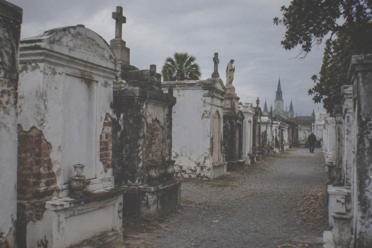 Rows of weathered above-ground tombs packed together inside a historic New Orleans cemetery